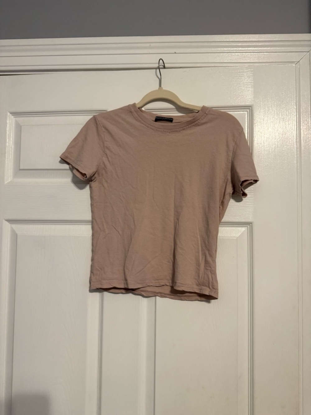 Brandy Melville Blush Tee - Short Sleeve Crew has a flaw on neck the threading